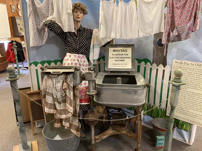 The Spring Historical Museum features a 1930s washing machine and vintage clothing.